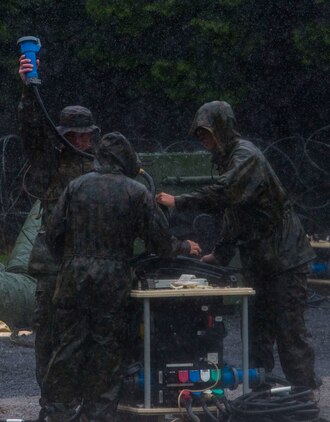 U.S. Marines attached to Marine Wing Support Squadron (MWSS) 171, based out of Marine Corps Air Station Iwakuni, set up a generator while establishing a second forward operating base during exercise Eagle Wrath 2017 at Combined Arms Training Center Camp Fuji, Japan, June 21, 2017. Forward operating bases and forward arming and refueling points were established during the two-week exercise to train the Marines to provide explosives, weaponry, fuel, security, logistics and personnel to a forward line of troops and aircraft. (U.S. Marine Corps photo by Lance Cpl. Stephen Campbell)