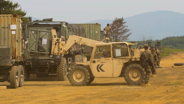 U.S. Marines attached to Marine Wing Support Squadron (MWSS) 171, based out of Marine Corps Air Station Iwakuni, load up supplies and equipment onto trucks as they prepare to move to a new location during exercise Eagle Wrath 2017 at Combined Arms Training Center Camp Fuji, Japan, June 20, 2017. Forward operating bases and forward arming and refueling points were established during the two-week exercise to train the Marines to provide explosives, weaponry, fuel, security, logistics and personnel to a forward line of troops and aircraft. (U.S. Marine Corps photo by Lance Cpl. Stephen Campbell)
