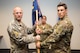 POPE ARMY AIRFIELD, N.C. -- Maj. Randy Harvey (right) accepts the 21st Special Tactics Squadron guidon from Col. Spencer Cocanour, 720th Special Tactics Group commander, during a ceremony in the Airmen's Center here June 20. Harvey took command of the 21st STS from Lt. Col. Stewart Parker, and comes to Pope as a recent graduate of the Air University Air Command and Staff College at Maxwell Air Force Base, Ala. (U.S. Air Force photo/Marc Barnes)