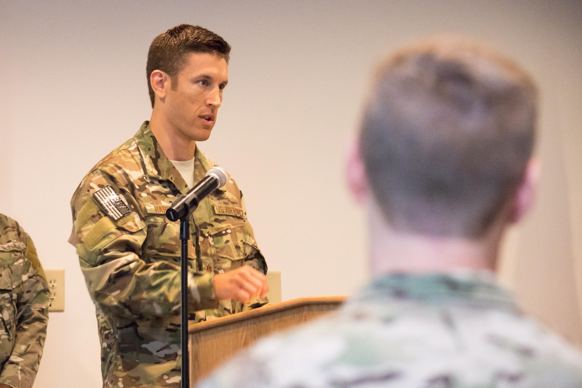 POPE ARMY AIRFIELD, N.C. -- Maj. Randy Harvey addresses the Airmen of the 21st Special Tactics Squadron and other guests during the unit's change-of-command ceremony here June 20. Harvey took command of the 21st STS from Lt. Col. Stewart Parker, and comes to Pope as a recent graduate of the Air University Air Command and Staff College at Maxwell Air Force Base, Ala. (U.S. Air Force photo/Marc Barnes)