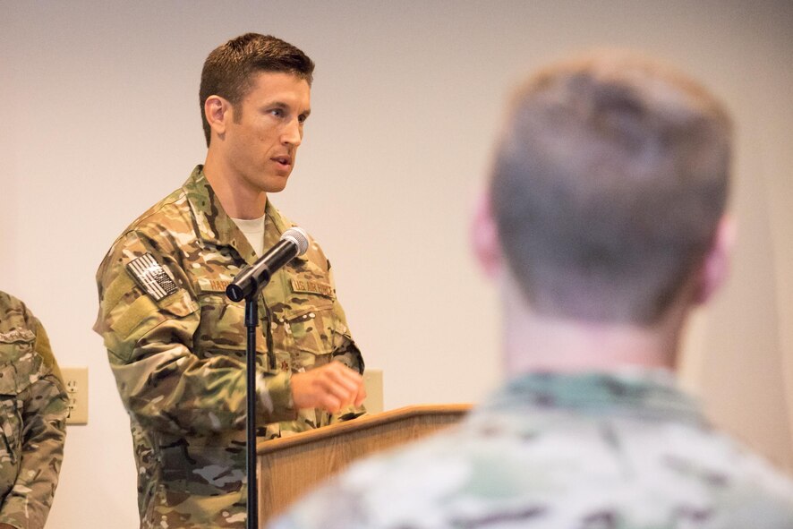 POPE ARMY AIRFIELD, N.C. -- Maj. Randy Harvey addresses the Airmen of the 21st Special Tactics Squadron and other guests during the unit's change-of-command ceremony here June 20. Harvey took command of the 21st STS from Lt. Col. Stewart Parker, and comes to Pope as a recent graduate of the Air University Air Command and Staff College at Maxwell Air Force Base, Ala. (U.S. Air Force photo/Marc Barnes)