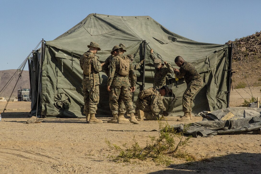 TWENTYNINE PALMS, Calif. – Marines with Combat Logistics Battalion 453, Combat Logistics Regiment 4, 4th Marine Logistics Group, Marine Forces Reserve, build the forward battalion aid station during Integrated Training Exercise 4-17, in Twentynine Palms, California on June 21, 2017. The Marines prepared for the arrival of 2nd Battalion, 25th Marine Regiment, 4th Marine Division, MARFORRES, with medical care, meals, water and fuel during the final battalion exercise of ITX 4-17.