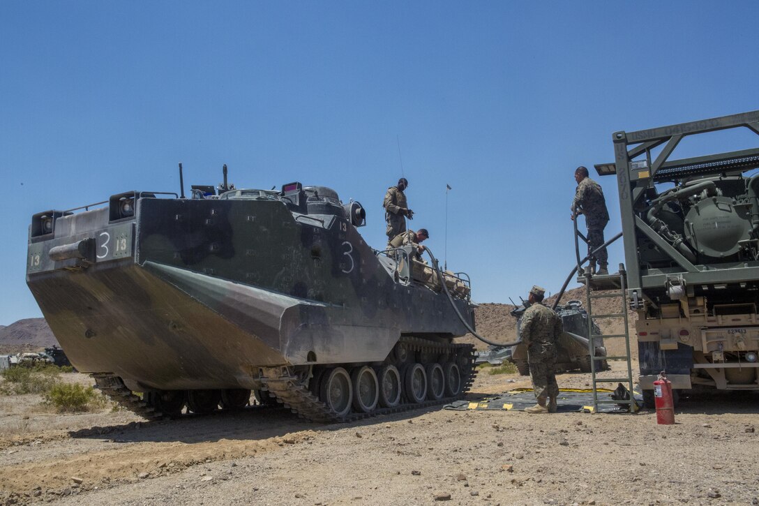 TWENTYNINE PALMS, Calif. – Marines with 2nd Battalion, 25th Marine Regiment, 4th Marine Division, Marine Forces Reserve, refuel Assault Amphibious Vehicles at the combat service area before returning to the finial battalion exercise of Integrated Training Exercise 4-17 in Twentynine Palms, California on June 21, 2017. The Marines received support from Combat Logistics Battalion 453, Combat Logistics Regiment 4, 4th Marine Logistics Group, MARFORRES, who provided medical aid, fuel, meals, water and other services during the final battalion exercise of ITX4-17.