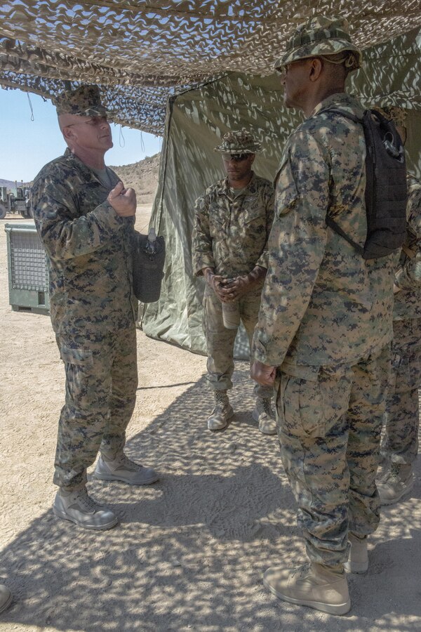 TWENTYNINE PALMS, Calif. – Sgt. Maj. Coppes, Sgt. Maj. of Combat Logistics Battalion 453, Combat Logistics Regiment 4, 4th Marine Logistics Group, Marine Forces Reserve, talks to the Navy medical personnel during Integrated Training Exercise 4-17 in Twentynine Palms, California on June 23, 2017. Sgt. Maj. Coppes spoke with corpsmen to ensure they had enough ready equipment to support 2nd Battalion, 25th Marine Regiment, 4th Marine Division, MARFORRES, during the final battalion exercise of ITX 4-17.