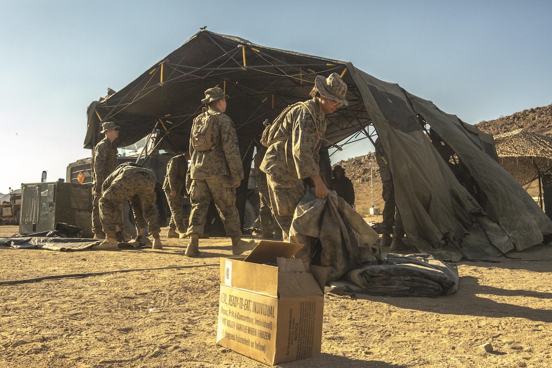 TWENTYNINE PALMS, Calif. – Marines with Combat Logistics Battalion 453, Combat Logistics Regiment 4, 4th Marine Logistics Group, MARFORRES, take down the forward battalion aid station during Integrated Training Exercise 4-17 in Twentynine Palms, California on June 23, 2017. The Marines relocated the BAS throughout the training evolution to maintain close proximity with and provide rapid response to potential casualties of 2nd Battalion, 25th Marine Regiment, 4th Marine Division, MARFORRES, during the final battalion exercise of ITX 4-17.