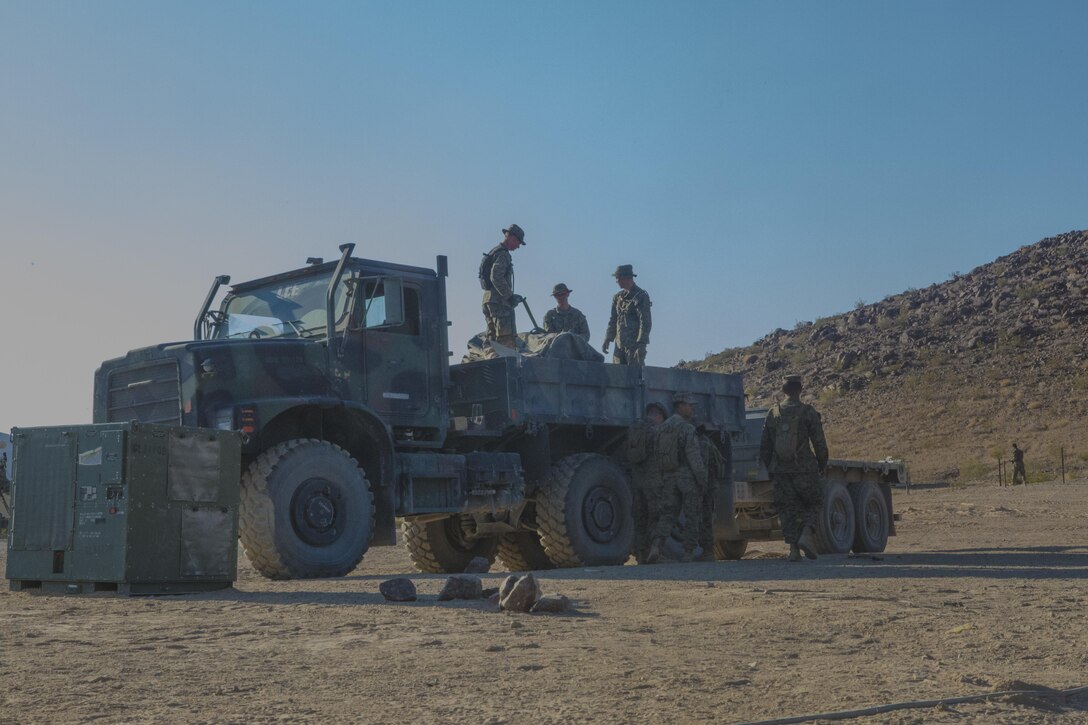 TWENTYNINE PALMS, Calif. –  Marines with Combat Logistics Battalion 453, Combat Logistics Regiment 4, 4th Marine Logistics Group, Marine Forces Reserve, transport equipment between forward aid stations during Integrated Training Exercise 4-17 in Twentynine Palms, California on June 23, 2017. The Marines relocated the tents and medical equipment to maintain close proximity with and provide rapid response to potential casualties of 2nd Battalion, 25th Marine Regiment, 4th Marine Division, MARFORRES, during the final battalion exercise of ITX 4-17.