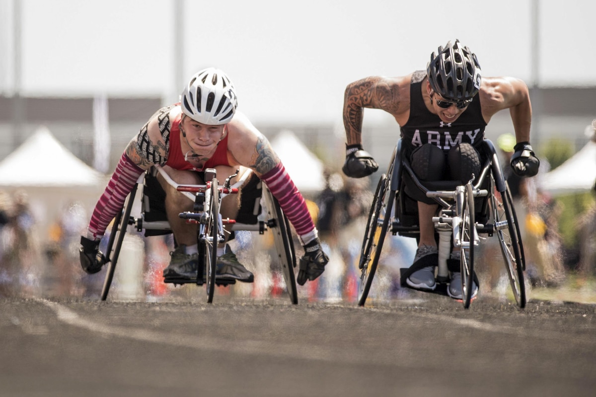A Marine and an Army veteran compete in a wheelchair racing event