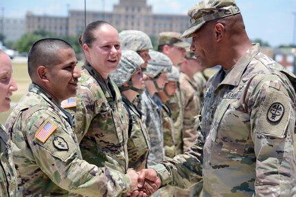 Maj. Gen. Patrick D. Sargent, deputy commanding general for operations, U.S. Army Medical Command and Chief Army Medical Service Corps, thanks Soldiers June 29 from AMEDD Center & School at Joint Base San Antonio-Fort Sam Houston for their support after practicing for the MEDEVAC demonstration the next day.