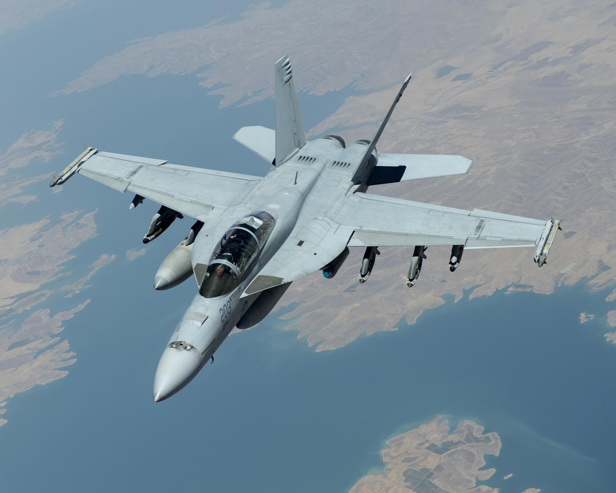 A Royal Australian Air Force EA-18F Super Hornet departs after receiving fuel from a U.S. Air Force KC-135 Stratotanker assigned to 340th Expeditionary Air Refueling Squadron in support of Operation Inherent Resolve on July 1, 2017. The KC-135 Stratotanker provides aerial refueling support to U.S. and coalition aircraft 24/7 throughout the U.S. Air Forces Central Command area of responsibility. (U.S. Air Force photo by Tech. Sgt. Amy M. Lovgren)