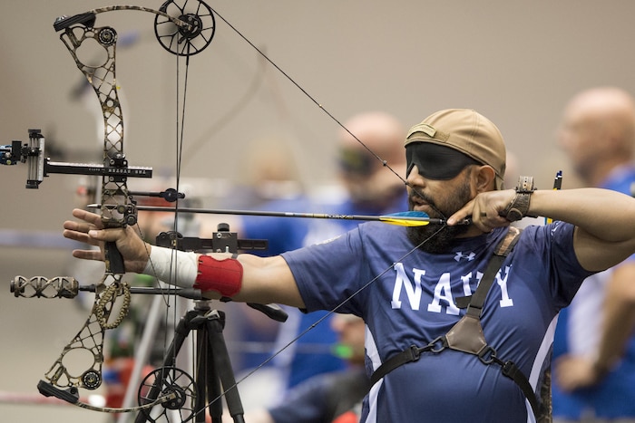 Navy veteran Petty Officer 2nd Class Adrian Mohammed competes as a visually impaired archer during the 2017 Department of Defense Warrior Games in Chicago, July 3, 2017. DoD photo by EJ Hersom