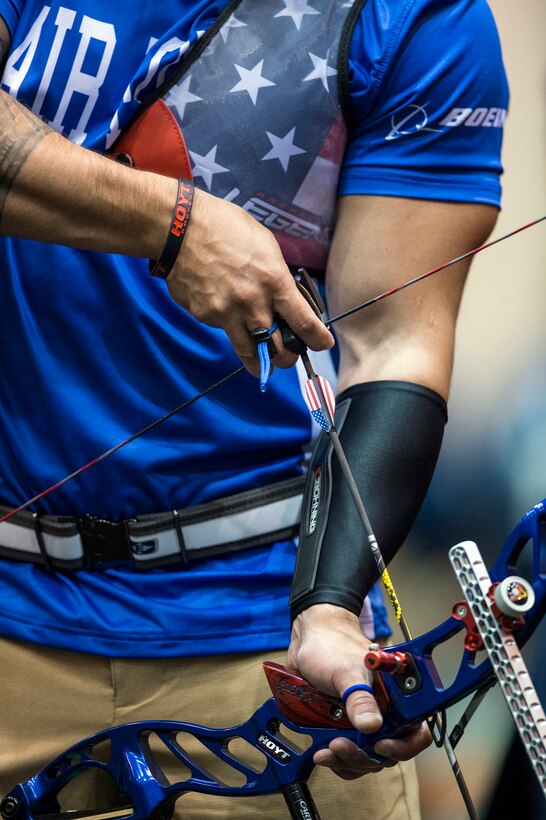 An archer nocks an arrow during archery competition in the 2017 Department of Defense Warrior Games in Chicago, July 3, 2017. The DoD Warrior Games are an annual event allowing wounded, ill and injured service members and veterans to compete in Paralympic-style sports. DoD photo by EJ Hersom