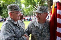 Recently retired wing commander, Col. Jonathan Philebaum, shakes hands and congratulates Master Sgt. Gerald Sonnenberg, a former public affairs specialist and historian, on his upcoming retirement from the 932nd History Office  (Sunday, July 9 at 2 p.m.)  The two were proud and honored as they joined other 932nd AW volunteers to represent the Illinois unit, 22nd Air Force and Air Force Reserve Command in the July 1, 2017 VP parade in Saint Louis.  (U.S. Air Force photo by Lt. Col. Stan Paregien)