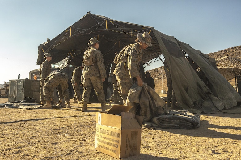 Marines with Combat Logistics Battalion 453, Combat Logistics Regiment 4, 4th Marine Logistics Group, take down the forward battalion aid station during Integrated Training Exercise 4-17 in Twentynine Palms, California on June 23, 2017. The Marines relocated the BAS throughout the training evolution to maintain close proximity with and provide rapid response to potential casualties of 2nd Battalion, 25th Marine Regiment, 4th Marine Division, MARFORRES, during the final battalion exercise of ITX 4-17.