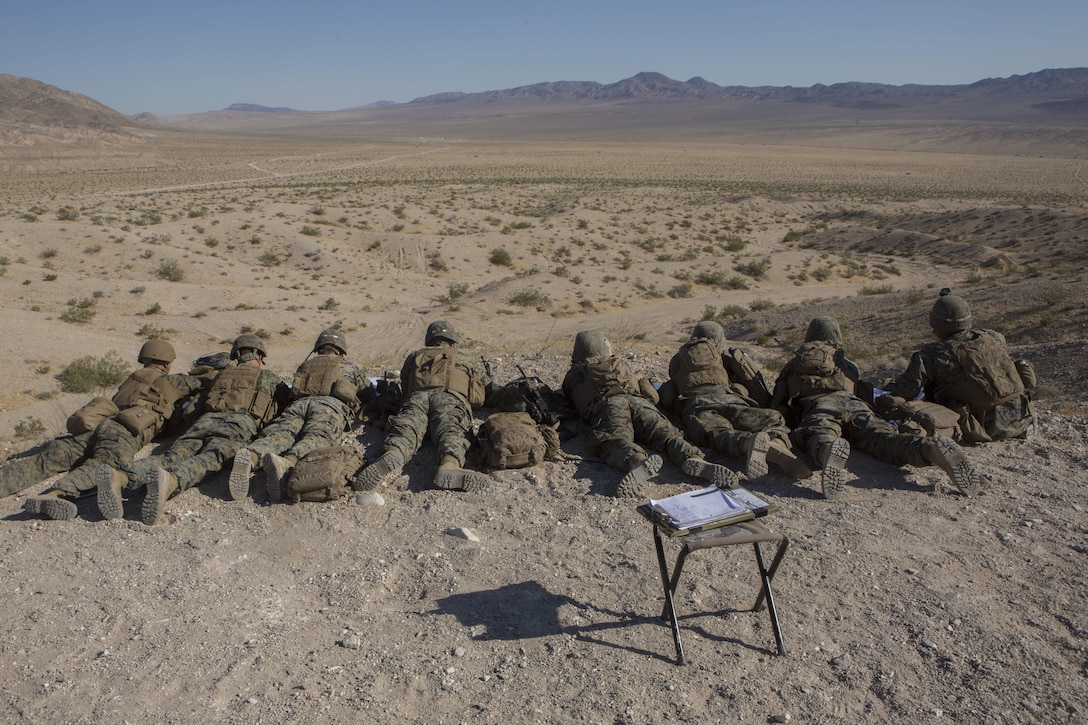 U.S. Marines with Fire Support Team, Echo Company, 2nd Battalion, 24th Marine Regiment, 4th Marine Division, Marine Forces Reserve, direct artillery fire and close air support onto enemy positions, as apart of the Fire Support Coordination Exercise, a training event during Integrated Training Exercise 4-17 at Camp Wilson, Marine Corps Air Ground Combat Center, Twentynine Palms, California on June 26th, 2017. ITX allows Marine Corps Reservists to maintain familiarity with basic military requirements and offers them an opportunity to learn from the difficulties associated with operating in an austere environment. 