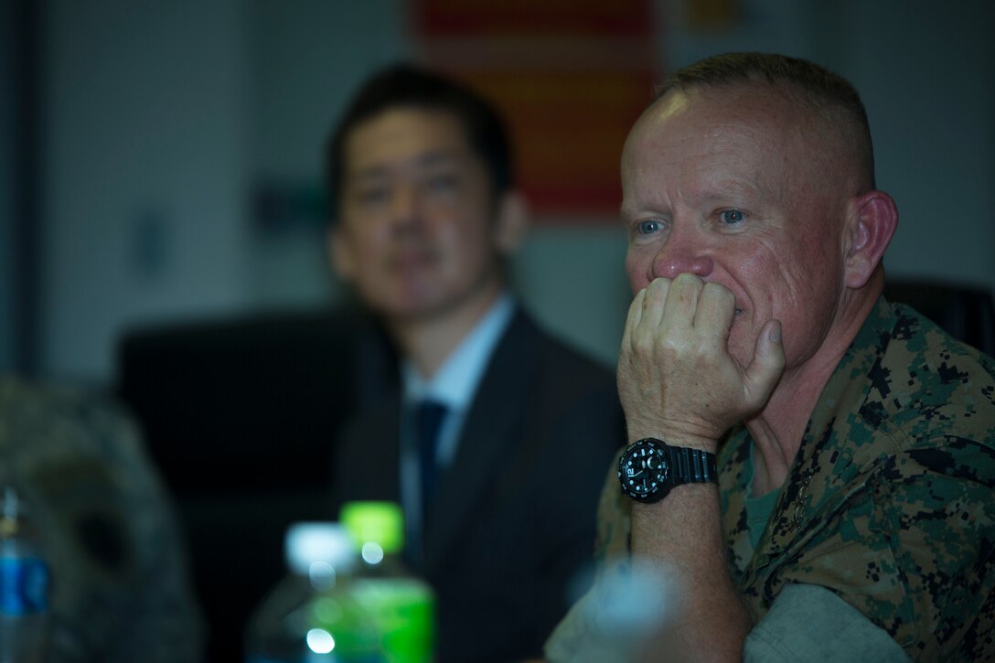 Lt. Gen. Lawrence D. Nicholson listens to a student speak and ask questions at the Japan-America Student Conference June 30, 2017, at III Marine Expeditionary Force Headquarters, Camp Courtney, Okinawa, Japan. The Japan-America Student Conference is an educational and cultural exchange program for university students. Nicholson spoke with the students to discuss the purpose of military presence in Okinawa, the Japan-American alliance, and Japan’s continuing partnership with the United States. Nicholson is the III Marine Expeditionary Force commanding general and the Okinawa Area Coordinator. (U.S. Marine Corps photo by Lance Cpl. Andrew Neumann) 