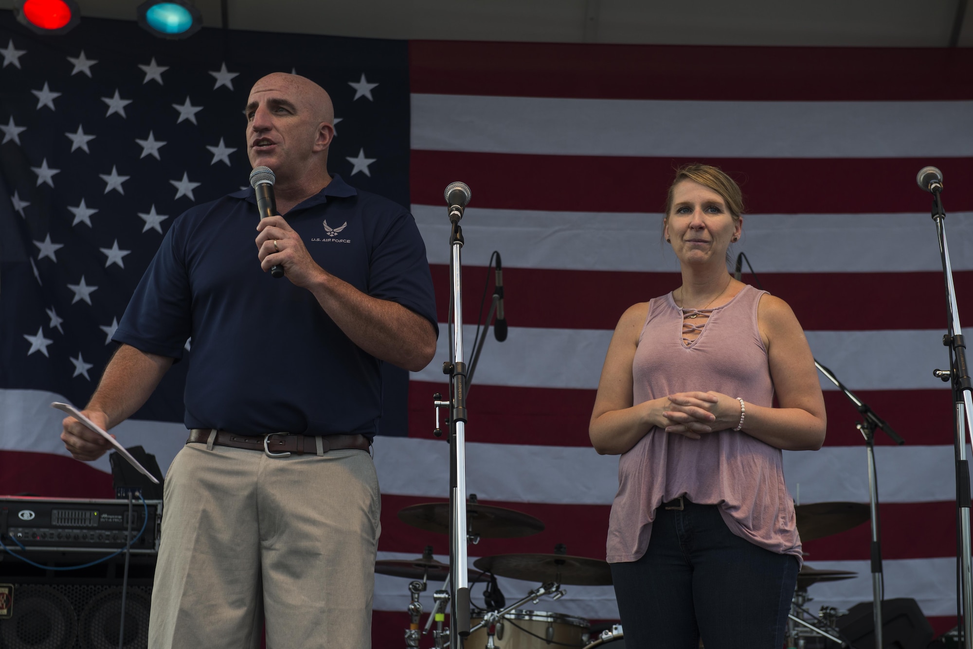 Col. Kenneth Moss, 374th Airlift Wing commander, gives holiday remarks to those in attendance at the Celebrate America festival on Yokota Air Base, Japan, June 30, 2017. The annual festival gives service members and their families a chance to come together to celebrate America's independence day. (U.S. AIr Force photo by Staff Sgt. David Owsianka)