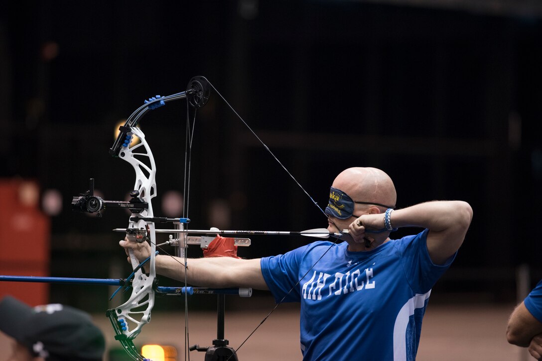 Air Force Staff Sgt. John P. Meyer, Jr. competes in the visually impaired category in archery during the 2017 Department of Defense Warrior Games in Chicago, July 3, 2017. DoD photo by Roger L. Wollenberg 