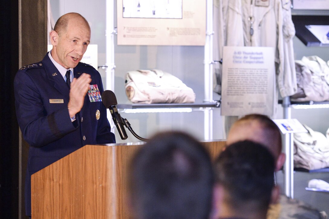 U.S. Air Force Gen. Mike Holmes, commander, Air Combat Command, provides remarks during the Silver Star medal presentation for retired Air Force Lt. Col. Gregory Thornton at the National Museum of the United States Air Force in Dayton, Ohio, June 30, 2017. Thornton received the metal for his actions on April 6, 2003 while supporting ‘Advance 33,’ the call sign for a ground forward air controller attached to Task Force 2nd Battalion, 69th Armor, during combat operations in Iraq. The Silver Star is the third highest medal for valor in the military. (U.S. Air Force photo by Wesley Farnsworth) 