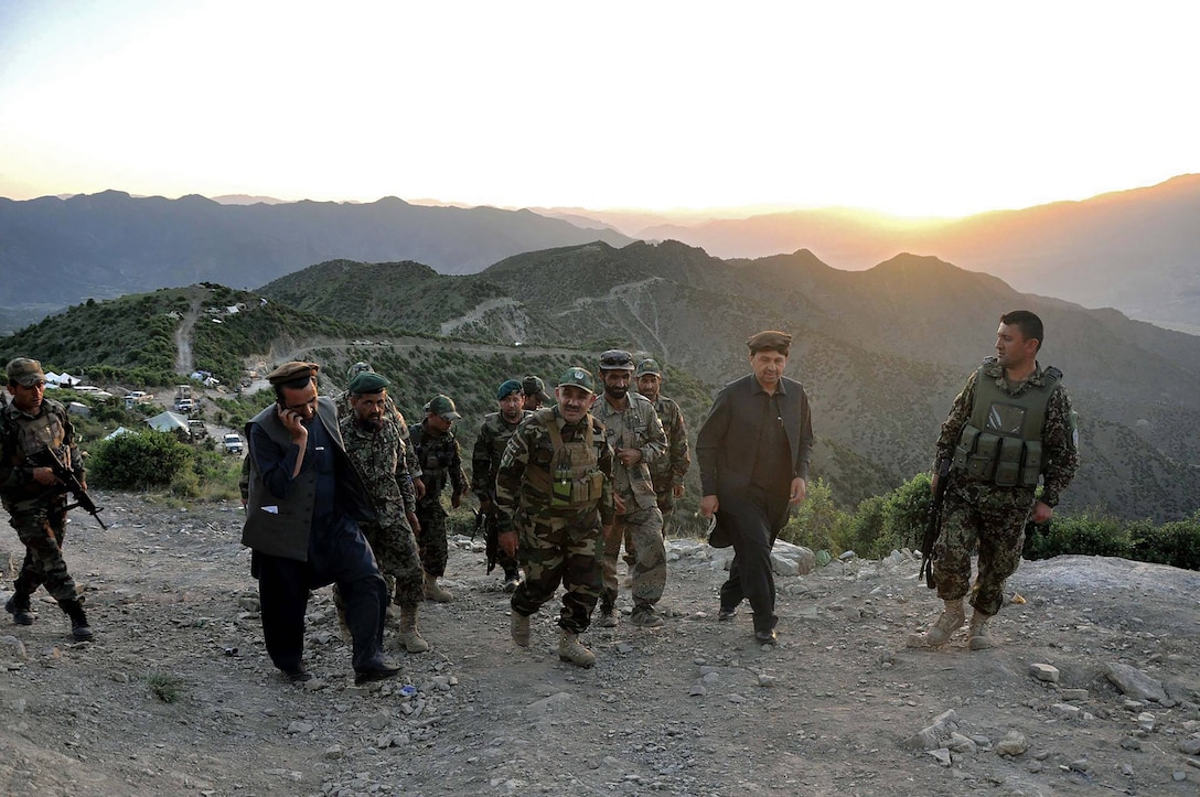 Brig. Gen. Abdul Wasea Milad,(center of photo) Commander of ANA 203rd “Thunder” Corps inspects operations May 21 in Dand-e-Patan district of southeastern Afghanistan during operations to secure routes through the Spin Ghar “White Mountain” range. (Afghanistan National Army photo provided by 203rd Police Zone PAO.)