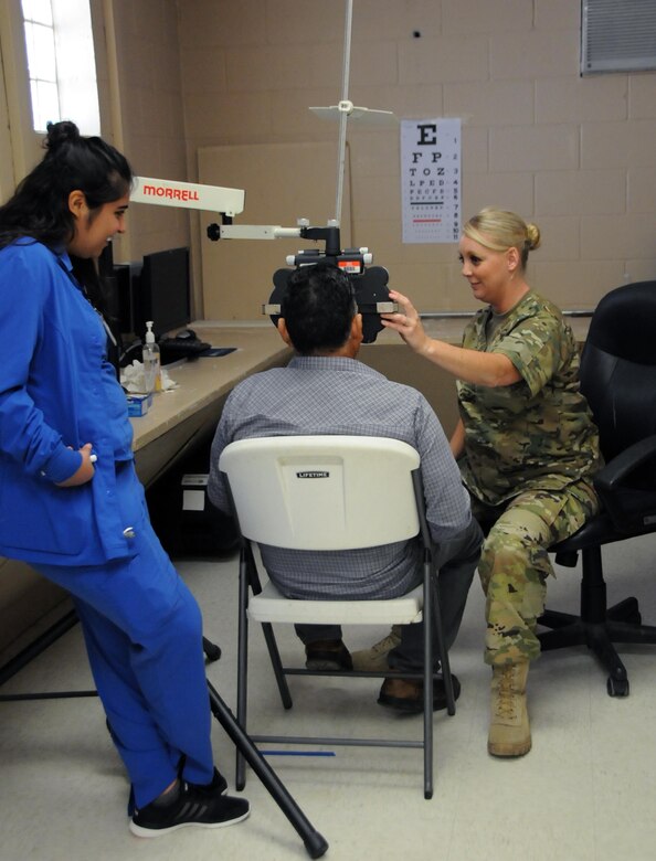 Maj. Jennifer Meadows, an optometrist assigned to 7226th Medical Support Unit located in Fort Jackson, South Carolina, works with local residents at El Cenizo community center. Meadows is one of approximately 125 U.S. Army Reserve Soldiers who are working in partnership with the Texas A&M Colonias program to provide medical care to Webb County’s under-served Colonias population. Services provided by Army Reserve personnel are done through the Department of Defense’s Innovative Readiness Training, a civil-military program that builds mutually beneficial partnerships between U.S. communities and the DoD. The missions selected meet training and readiness requirements for Army Reserve service members while integrating them as a joint and whole-of-society team to serve our American citizens.