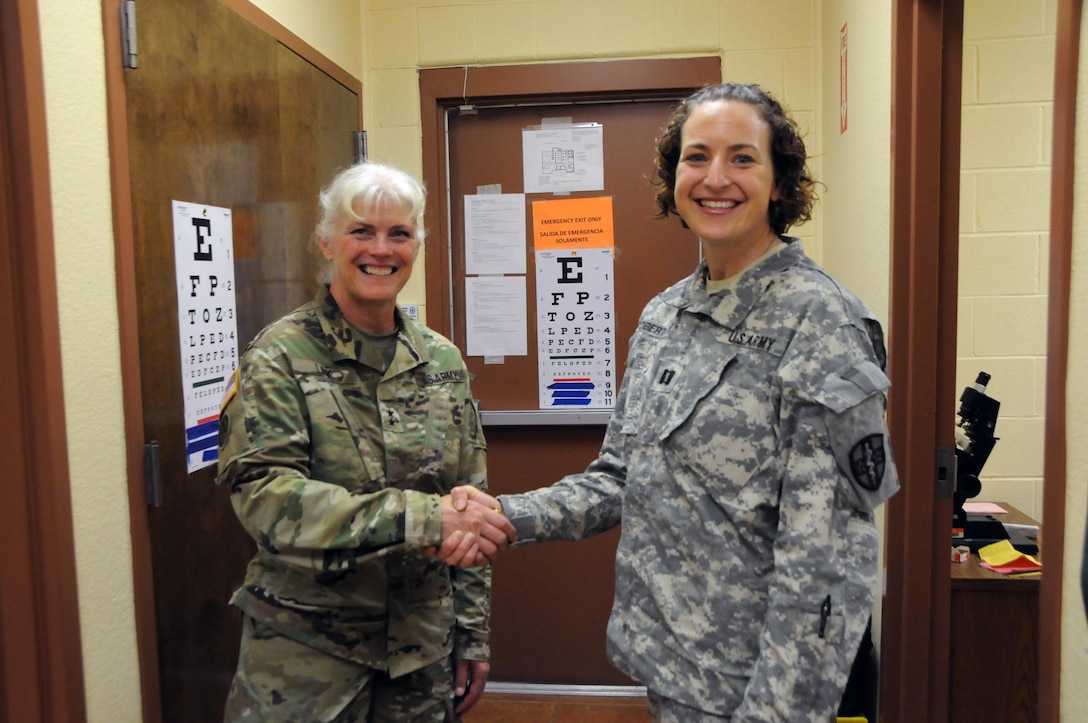 Maj. Gen. Mary Link, commanding general for Army Reserve Medical Command, recognizes optometrist, Capt. Trisha Roberts, for her hard work and commitment to providing care to residents at Fred and Anita Bruni Community Center located in Laredo, Texas. Roberts is assigned to the 7225th Medical Support Unit located in Greenville, South Carolina, and is one of approximately 125 U.S. Army Reserve Soldiers who are working in partnership with the Texas A&M Colonias program to provide medical care to Webb County’s under-served Colonias population. 
Services provided by Army Reserve personnel are done through the Department of Defense’s Innovative Readiness Training, a civil-military program that builds mutually beneficial partnerships between U.S. communities and the DoD. The missions selected meet training & readiness requirements for Army Reserve service members while integrating them as a joint and whole-of-society team to serve our American citizens.