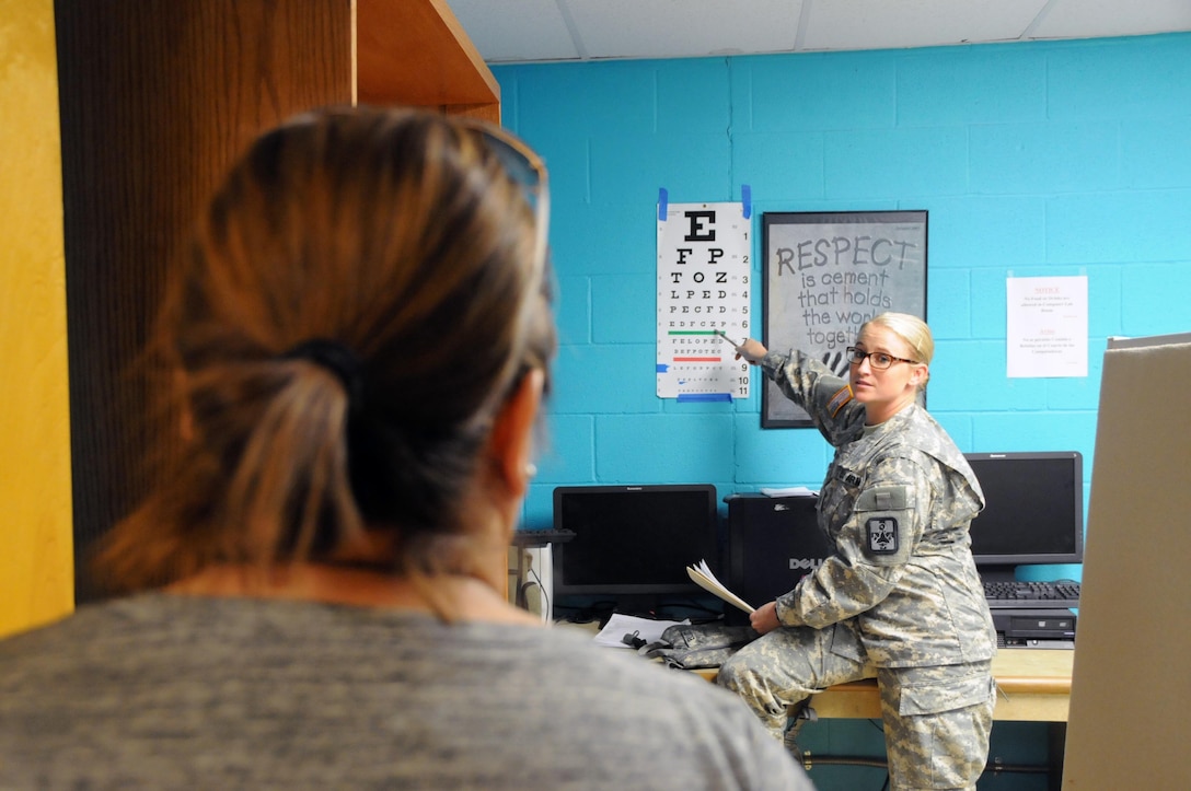 1st Lt. Anneliese Casey, an optometrist assigned to 77458th Medical Backfill Bn. located in Fort Bragg, North Carolina, works with local residents at La Teresita community center.  Casey is one of approximately 125 U.S. Army Reserve Soldiers who are working in partnership with the Texas A&M Colonias program to provide medical care to Webb County’s under-served Colonias population. Services provided by Army Reserve personnel are done through the Department of Defense’s Innovative Readiness Training, a civil-military program that builds mutually beneficial partnerships between U.S. communities and the DoD. The missions selected meet training & readiness requirements for Army Reserve service members while integrating them as a joint and whole-of-society team to serve our American citizens.