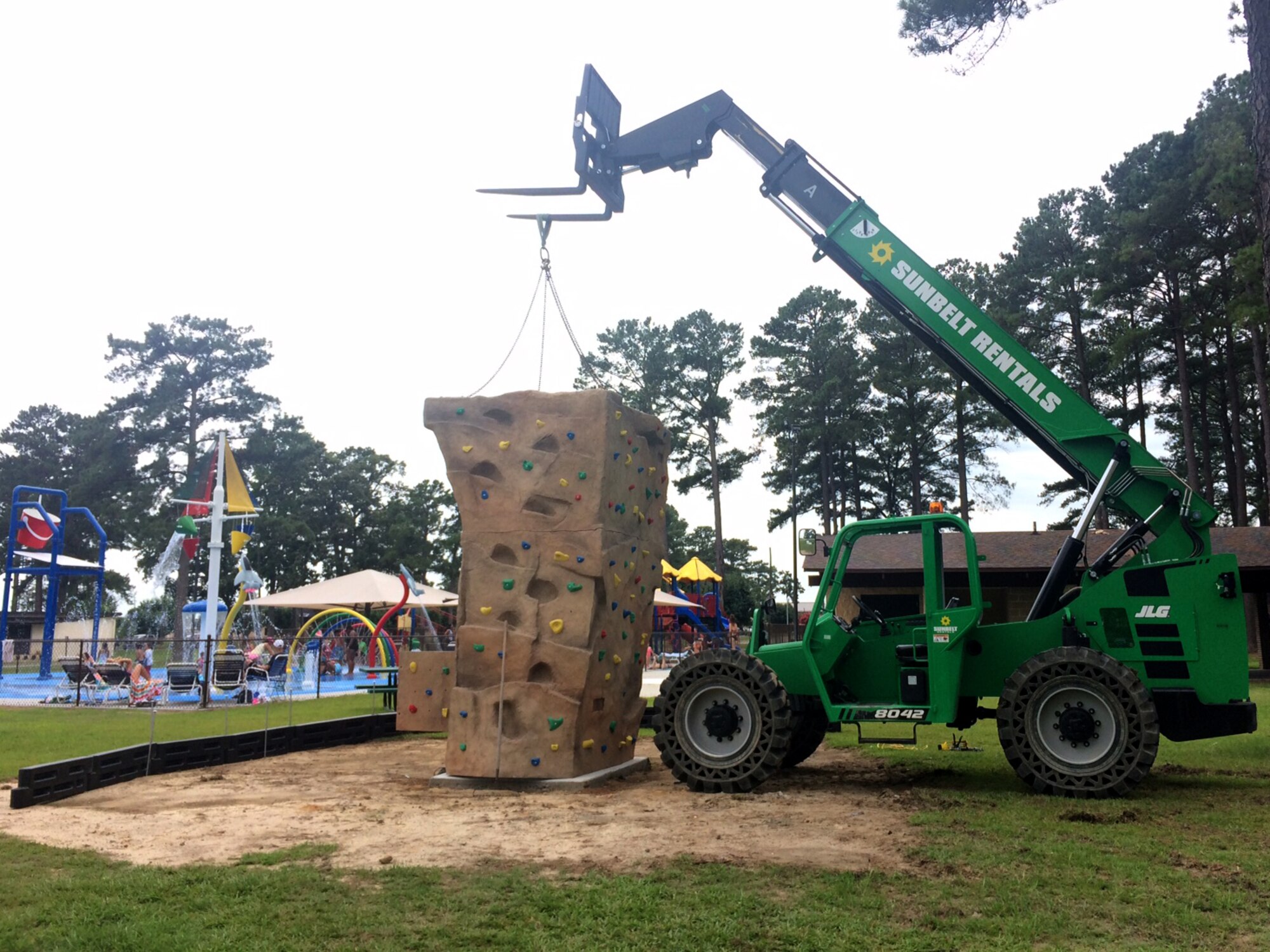 Members of the 4th Civil Engineer Squadron assemble a bouldering rock near Debden Park, June 27, 2017, at Seymour Johnson Air Force Base, North Carolina. For more information about the equipment call Outdoor Recreation at 919-722-1104.  (Courtesy photo)
