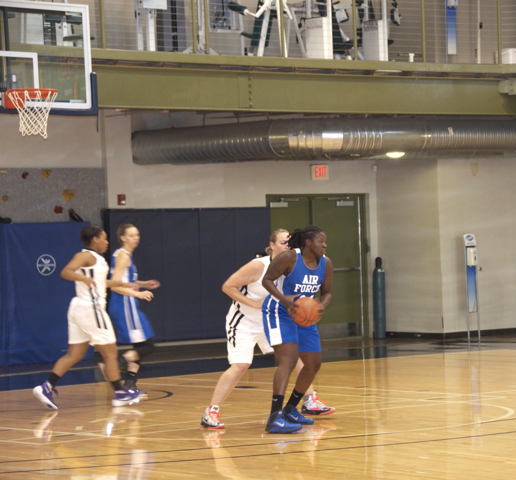 Staff Sgt. Charmaine Clark averaged 16 points per game to lead the All-Air Force women's basketball team to a third-place finish in the Armed Forces Tournament. (U.S. Air Force photo/Steve Warns)