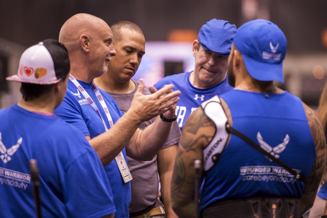 Team Air Force archery coach Jeff Matuszak speaks to the archery team during archery practice during the 2017 Department of Defense Warrior Games at McCormick Place-Lakeside Center in Chicago, June 30, 2017.  The 2017 Warrior Games runs through July 8 at various locations across the city of Chicago. Air Force photo by Staff Sgt. Keith James