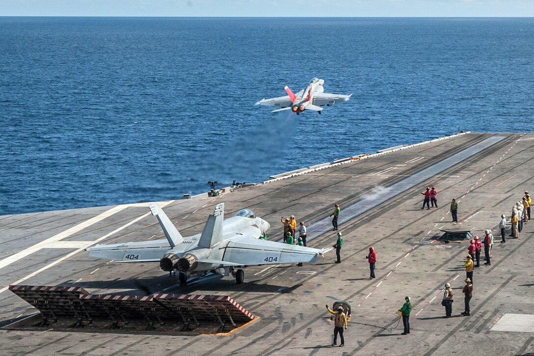 An EA-18G Growler takes off during flight operation from the flight deck aboard the aircraft carrier USS Ronald Reagan in western Pacific Ocean, June 26, 2017. The pilots are assigned to Electronic Attack Squadron 141. Navy photo by Petty Officer 3rd Class Kaila Peters