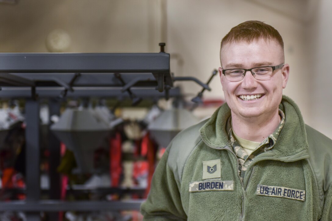 Air Force Tech. Sgt. Tom Burden, an F-16 Fighting Falcon weapons mechanic assigned to the Ohio Air National Guard's 180th Fighter Wing, poses for a portrait in the aircraft hangar in Swanton, Ohio, March 12, 2017. Burden invented a flexible, non-slip tool tray for aircraft mechanics. Ohio Air National Guard photo by Air Force Staff Sgt. Nic Kuetemeyer