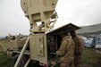 U.S. Army Spc. Isaiah Myles, a Command Post Node team chief assigned to Charlie Company, 44th Expeditionary Signal Battalion, 2nd Theater Signal Brigade, and Spc. Justin Pelzer, a CPN operator, check the settings on a Satellite Transportable Terminal July 3, 2017 in Cincu, Romania. Myles’ CPN team is providing communications support to the 497th Combat Sustainment Support Battalion, 55th Sustainment Brigade, a U.S. Army Reserve unit, during exercise Saber Guardian 17, a U.S. Army Europe-led, multinational exercise, taking place in Bulgaria, Hungary and Romania July 11-20, 2017. (U.S. Army photo by William B. King)