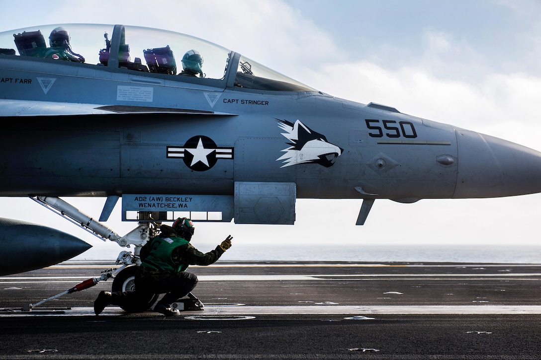 An EA-18G Growler prepares to launch from the flight deck aboard the aircraft carrier USS Theodore Roosevelt in the Pacific Ocean, June 25, 2017. The pilots are assigned to Electronic Attack Squadron 129. Navy photo by Petty Officer 3rd Class Anthony J. Rivera