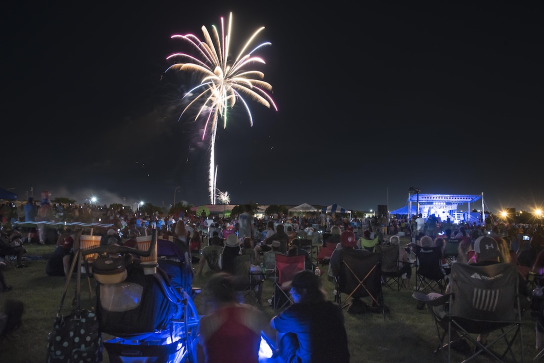 Wichita Falls, Texas, guests nearly filled the entire Freedom Fest event site at Sheppard Air Force Base as the sun began to set, July 4, 2017. The Freedom Fest firework display featured more than 1,000 shells that cracked, popped and lit up the night sky to conclude the event. (U.S. Air Force photo by Staff Sgt. Kyle E. Gese)