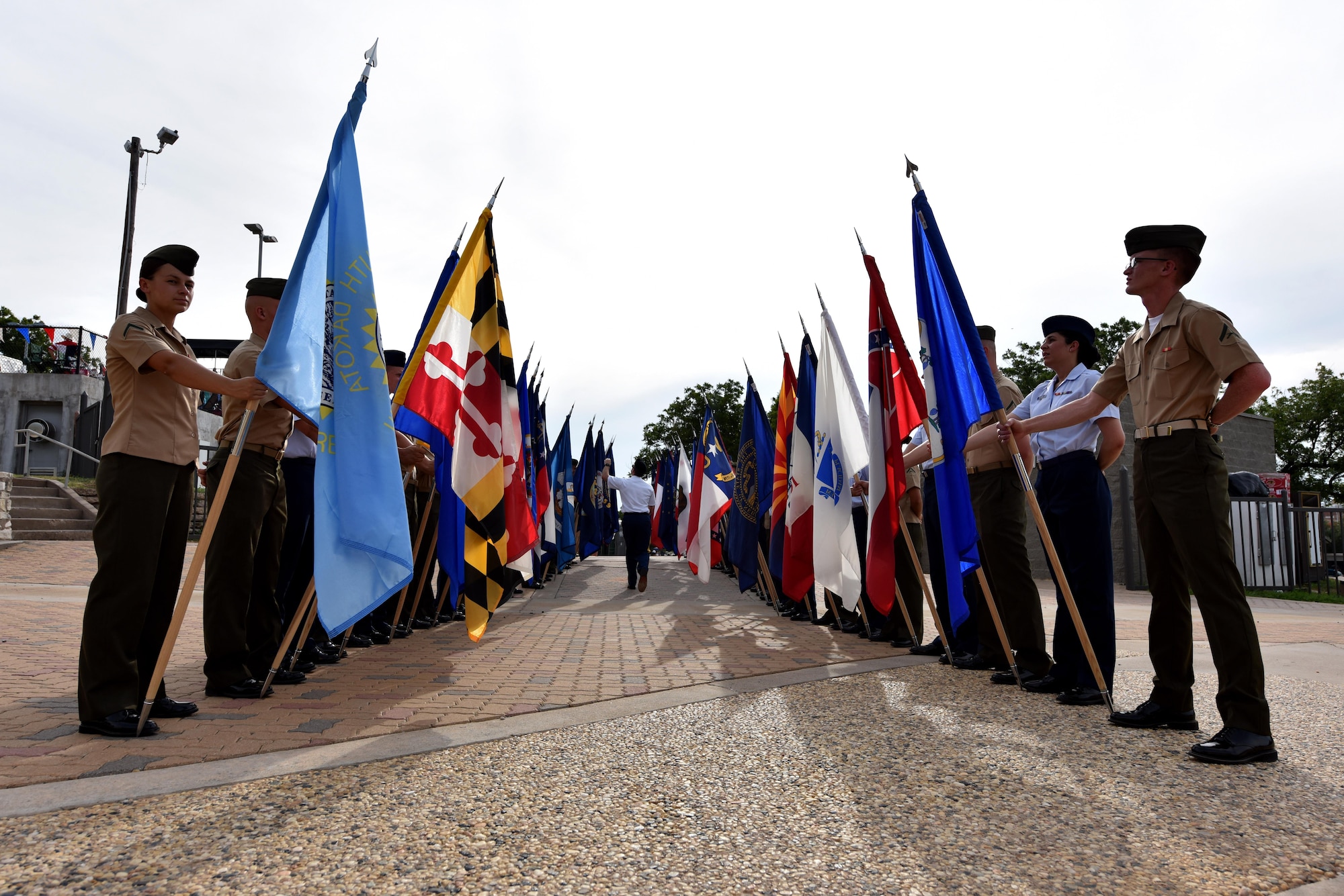 U.S. Army Sgt. Jason Scribner, 344th Military Intelligence Battalion NCO, inspects troops before the 30th Annual San Angelo Symphony’s Pops Concert at the Bill Aylor Sr. Memorial RiverStage in San Angelo, Texas, July 3, 2017. Later that night the service members presented all the U.S. state flags for the concert. (U.S. Air Force photo by Staff Sgt. Joshua Edwards/Released)