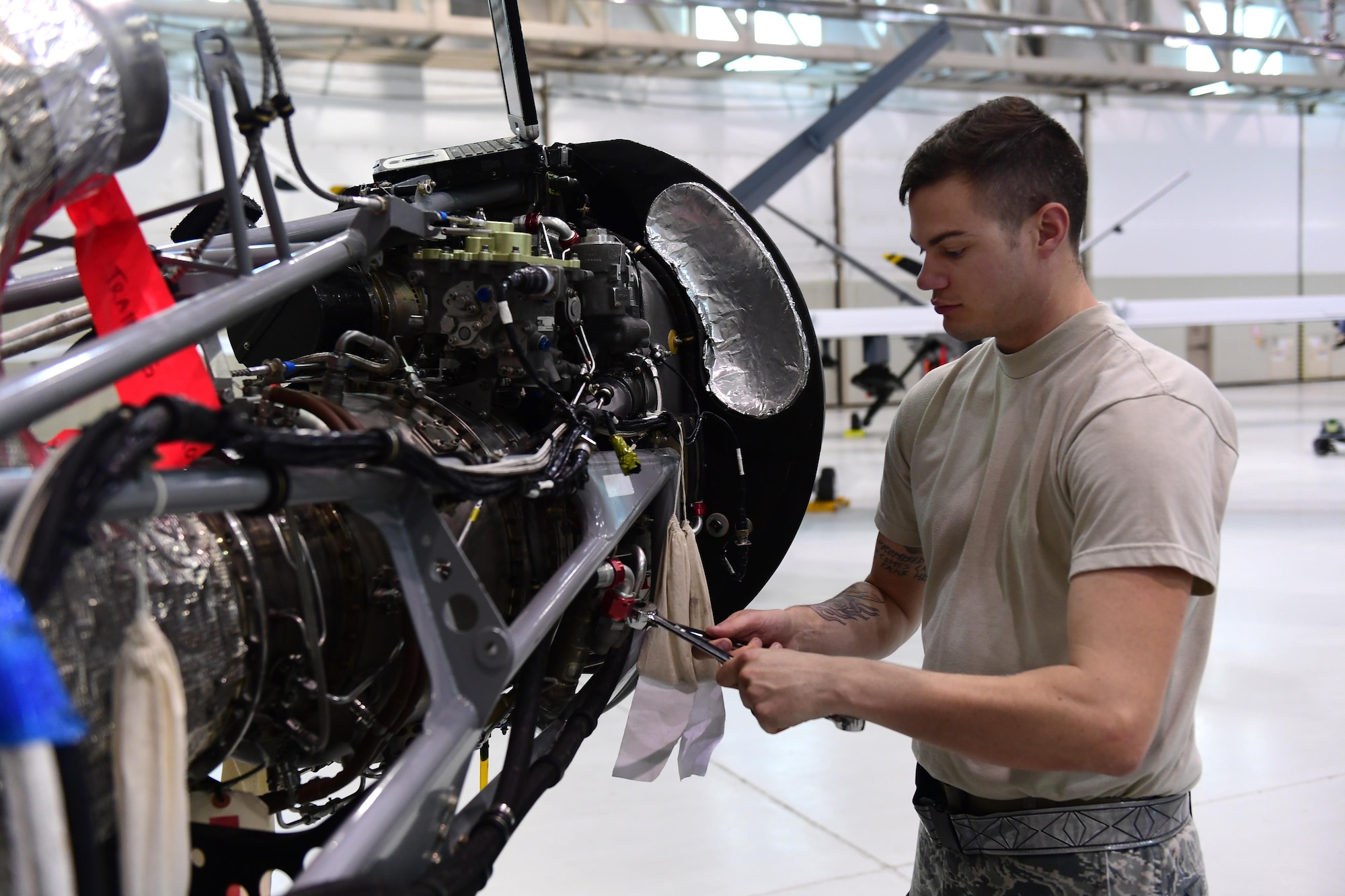Staff Sgt. Joshua, 432nd Aircraft Maintenance Squadron MQ-9 Reaper crew chief, uses an engine trainer to refresh his skills June 19, 2017, at Creech Air Force Base, Nev. The engine trainer can be programmed to display certain errors which maintainers must correct. (U.S. Air Force photo/Senior Airman Christian Clausen)