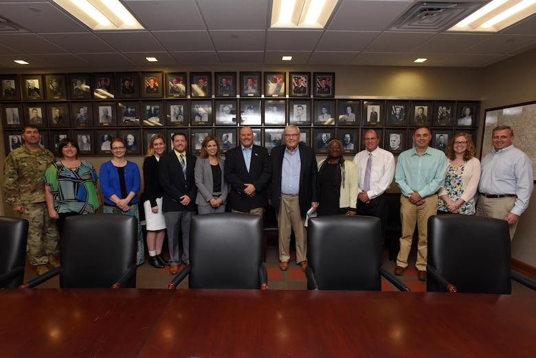 Corps of Engineers officials and signatories pose for a group photo at the conclusion of the lease signing ceremony for Lake Cumberland's Marina at Rowena held held at the district headquarters in the Estes Kefauver Federal Building at Nashville, Tenn., July 5, 2017. 