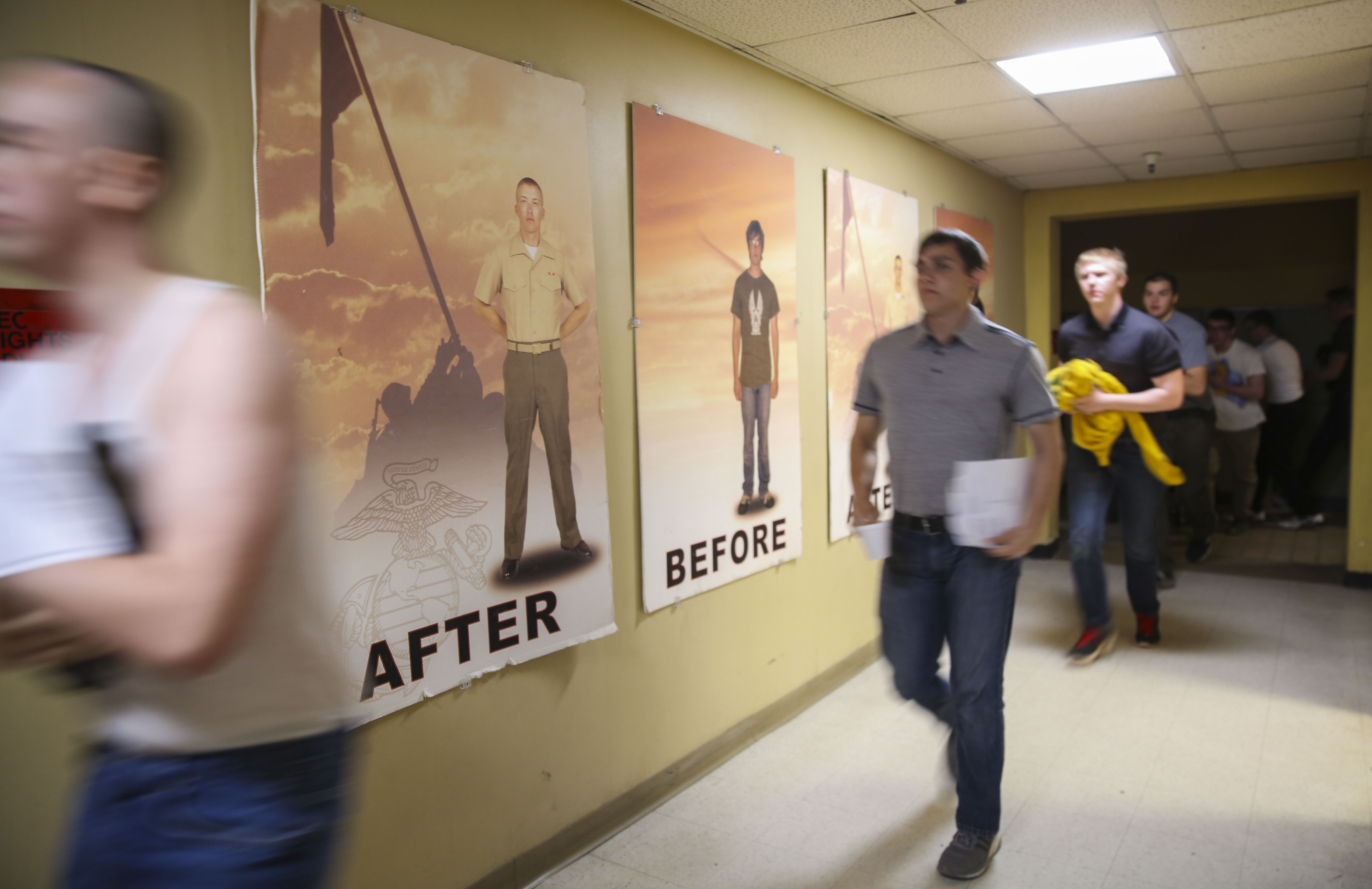 New recruits of Golf Company, 2nd Recruit Training Battalion, rush into the contraband room at Marine Corps Recruit Depot San Diego, May 15. Although recruits are confused and disoriented during this portion of training, the chaos serves a purpose during the transformation from civilian to Marine. Annually, more than 17,000 males recruited from the Western Recruiting Region are trained at MCRD San Diego. Golf Company is scheduled to graduate Aug. 11.