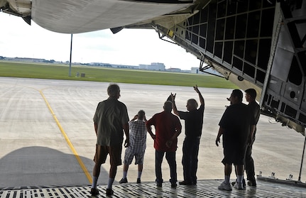 Staff Sgt. Cole Lance, 68th Airlift Squadron load master, shows veterans from Camino Real Community Services the aft load ramp on a C-5M Super Galaxy aircraft June 30, 2017 at Joint Base San Antonio-Lackland, Texas. CRCS is a Veteran informed agency that provides "peer to peer" outreach and support to veterans and their families. (U.S. Air Force photo by Benjamin Faske)