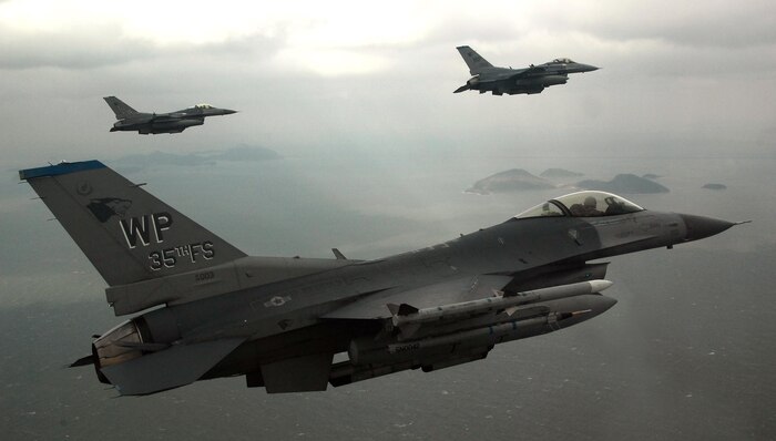 In this file photos, three F-16s from the 8th Fighter Wing conduct a training mission over the South Korean peninsula. Many pilots attached to the 8th FW will participate in the verification process at Kunsan Air Base to ensure they are as well prepared as possible for combat and the ability to lead their wingmen into combat. 