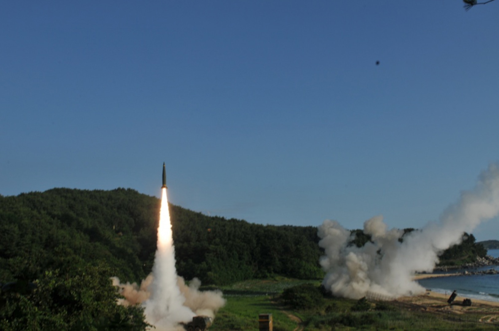 An M270 Multiple Launch Rocket System from 1st Battalion, 18th Field Artillery
 Regiment, 210th Field Artillery Brigade, 2nd Republic of Korea/United States Combined
 Division, fires an MGM-140 Army Tactical Missile into the East Sea, July 5. The missile
 launch demonstrated the combined deep strike capabilities which allow the ROK/U.S.
 Alliance to neutralize hostile threats and aggression against the ROK, U.S. and our
 Allies. 