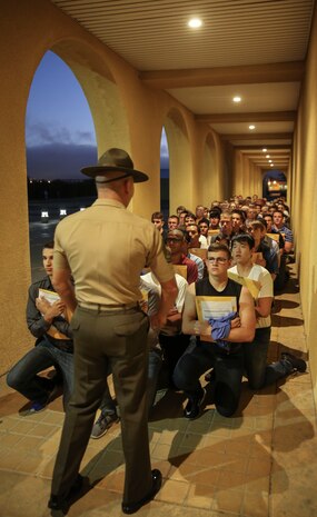 Recruits of Lima Company, 3rd Recruit Training Battalion, are welcomed to the depot during receiving at Marine Corps Recruit Depot San Diego, June 19. From this point on, recruits will eat, sleep and train as a team as they begin the transformation from civilian to Marine. Annually, more than 17,000 males recruited from the Western Recruiting Region are trained at MCRD San Diego. Lima Company is scheduled to graduate Sept. 15.