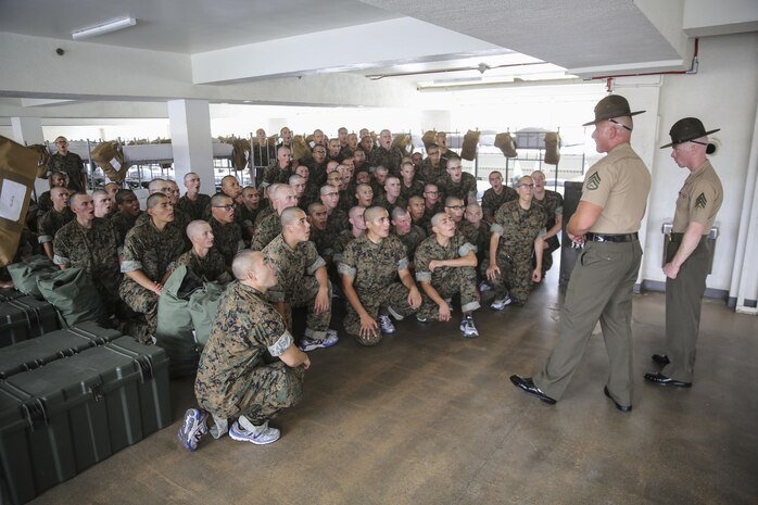 A senior drill instructor from Lima Company, 3rd Recruit Training Battalion, explains his expectations of the recruits during pick up at Marine Corps Recruit Depot San Diego, June 23. After spending the first week conducting in-processing, recruits marched to their new squad bay where their drill instructors introduced themselves, recited the Drill Instructor Creed and began carrying out the mission of transforming civilians into United States Marines. Annually, more than 17,000 males recruited from the Western Recruiting Region are trained at MCRD San Diego. Lima Company is scheduled to graduate Sept 15