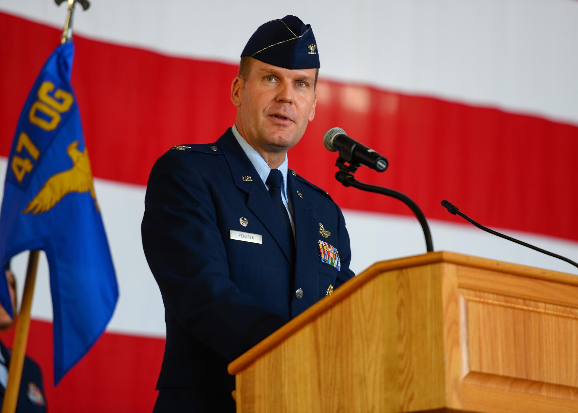 U.S. Air Force Col. Robert Pekarek, 47th Operations Group commander, speaks during the 47th OG Assumption of Command at Laughlin Air Force Base, Tx., June 22, 2017. Pekarek took command after previously serving as the joint doctrine development officer at the Joint Doctrine Analysis Division. (U.S. Air Force photo/Airman 1st Class Benjamin N. Valmoja)
