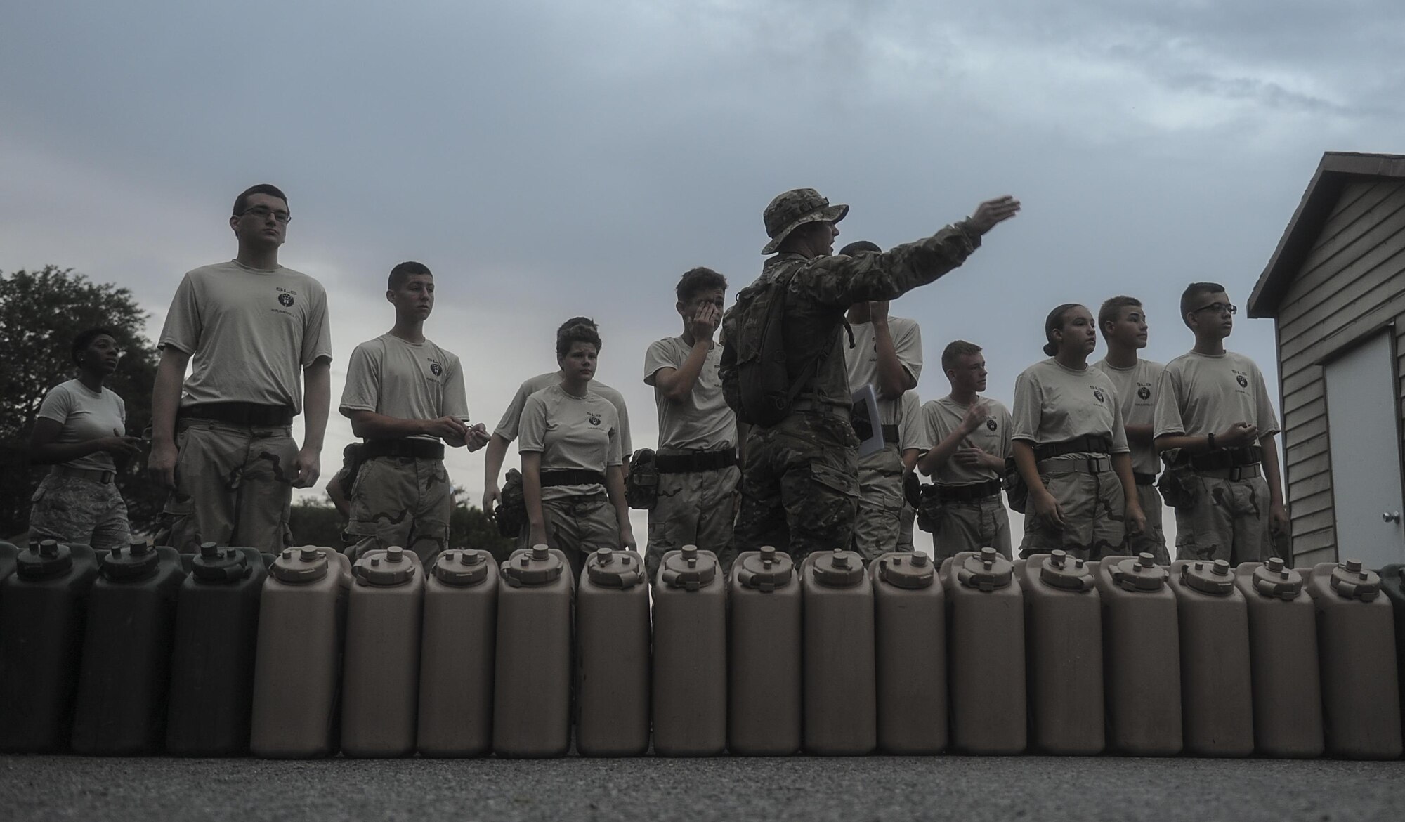 A Special Tactics Airman with the 23rd Special Tactics Squadron directs Junior ROTC cadets on an obstacle during a Monster Mash at Hurlburt Field, Fla., June 30, 2017.  The JROTC Summer Leadership School brought more than 50 cadets to Hurlburt Field to engage in a variety of team-building and leadership skill-developing exercises under the guidance of Air Commandos, June 26 through 30. (U.S. Air Force photo by Airman 1st Class Rachel Yates)