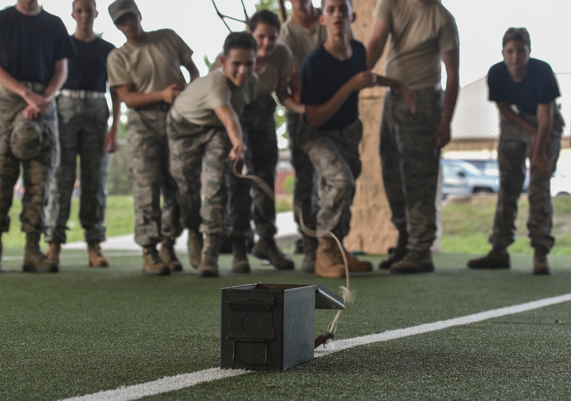 Junior ROTC cadets attempt to hook an ammo can during a leadership reaction course at Summer Leadership School at Hurlburt Field, Fla., June 27, 2017. Special Tactics Airmen partnered with more than 50 cadets from five local high schools for a week-long Summer Leadership Course to learn about leadership, teamwork, and self-confidence. (U.S. Air Force photo by Senior Airman Ryan Conroy)