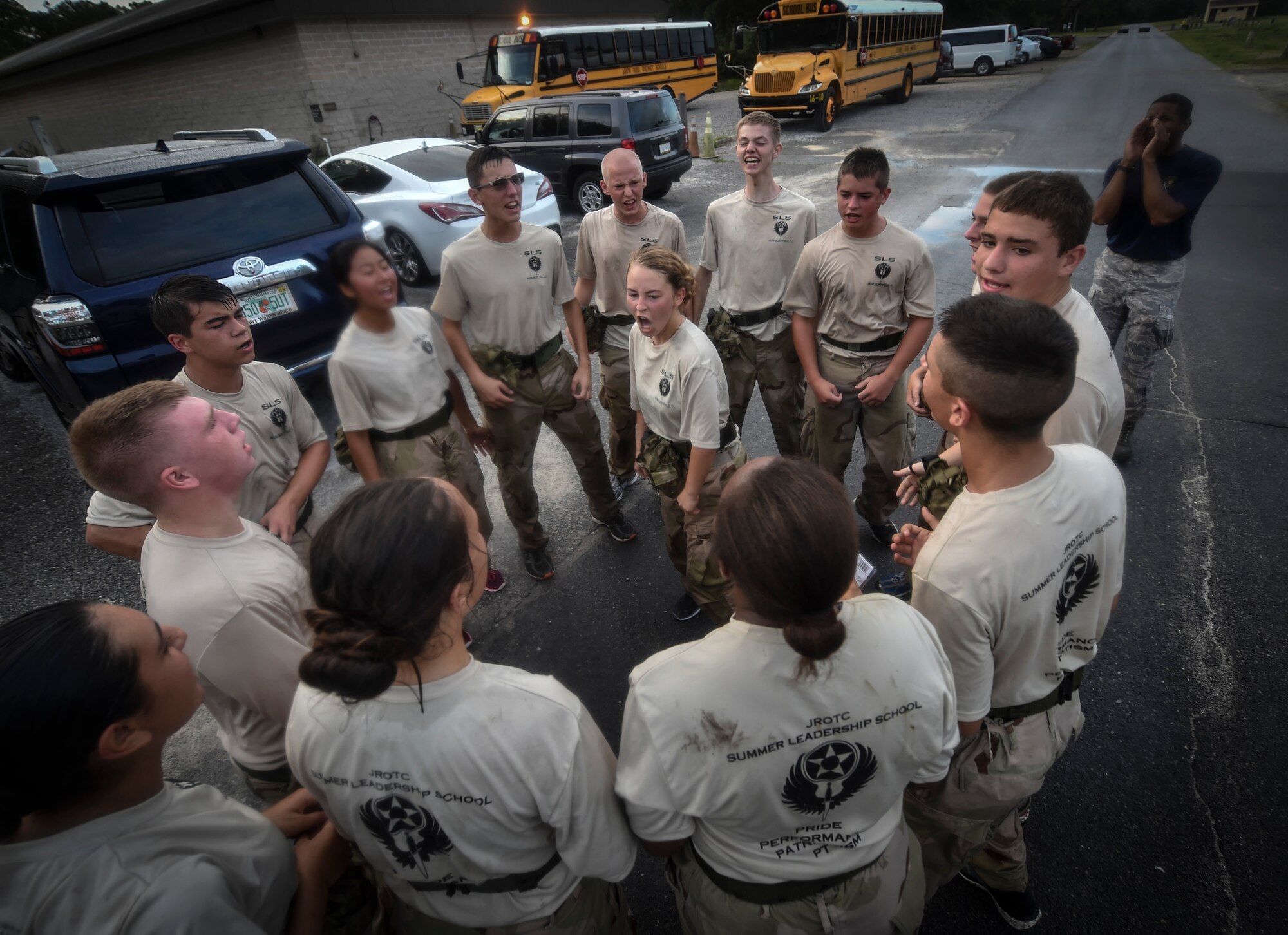 A Junior ROTC cadet motivates her team during a Monster Mash for Summer Leadership School at Hurlburt Field, Fla., June 30, 2017. Special Tactics Airmen partnered with more than 50 cadets from five local high schools for a week-long Summer Leadership Course to learn about leadership, teamwork, and self-confidence. (U.S. Air Force photo by Senior Airman Ryan Conroy) 