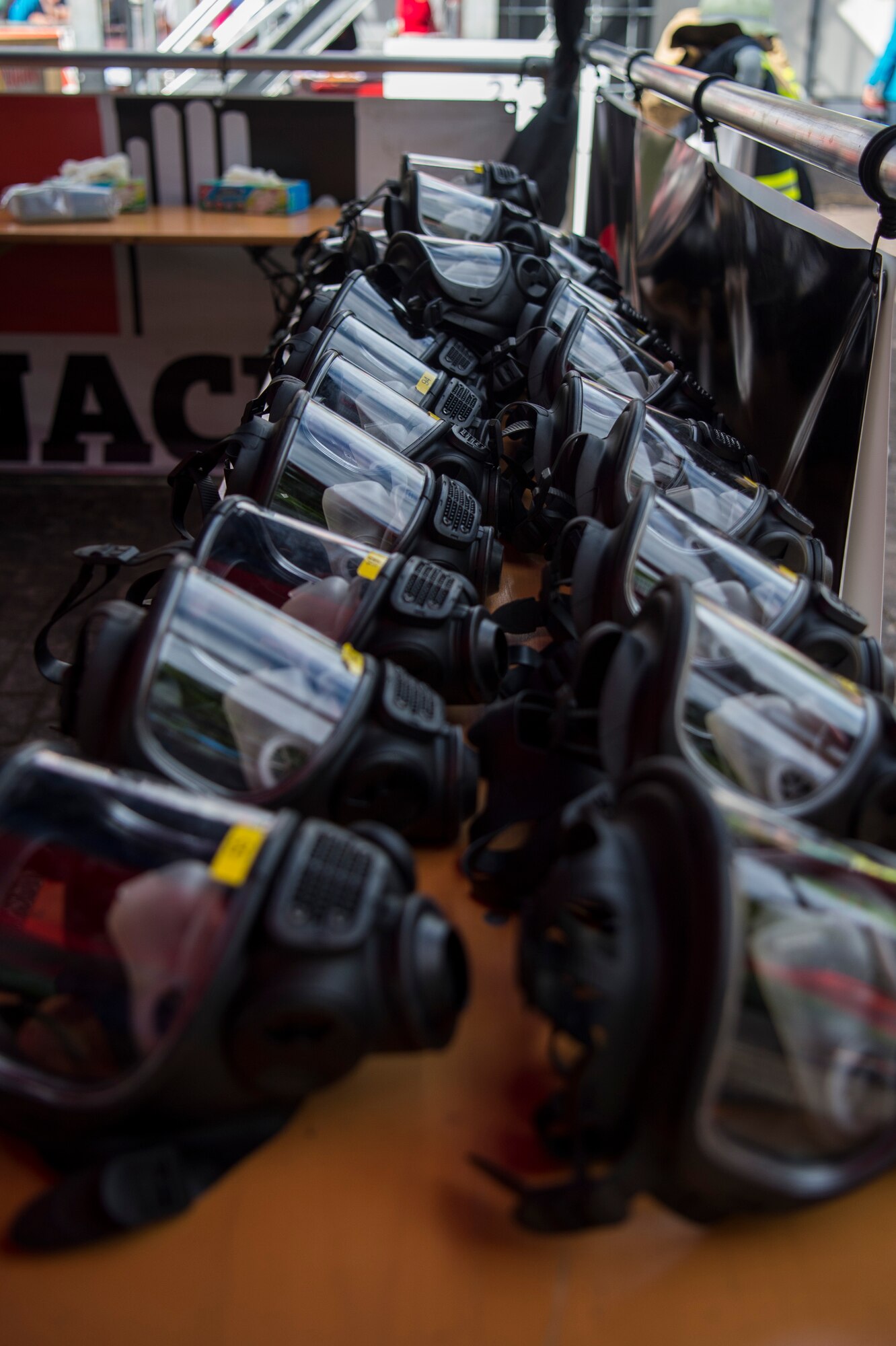 Firefighter masks sit on a table ready to be worn by competitors during the 4th annual Mosel Firefighter Combat Challenge in Ediger-Eller, Germany, June 30, 2017. More than 375 firefighters from 12 countries raced on an obstacle course against the clock. (U.S. Air Force photo by Senior Airman Preston Cherry)