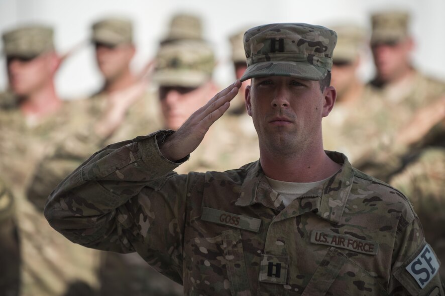Capt. Jared Goss, 332nd Expeditionary Security Forces Squadron operations officer, renders a salute during a retreat ceremony June 30, 2017, in Southwest Asia. The ceremony was held to honor and remember service members who have made the ultimate sacrifice. (U.S. Air Force photo/Senior Airman Damon Kasberg)