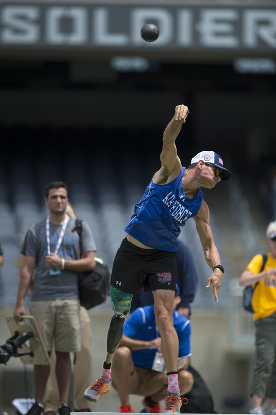 Air Force veteran Tech Sgt. Adam Popp throws shot put in the 2017 Department of Defense Warrior Games at Soldier Field in Chicago July 5, 2017. The Warrior Games are an annual event allowing wounded, ill and injured service members and veterans to compete in Paralympic-style sports. DoD photo by EJ Hersom